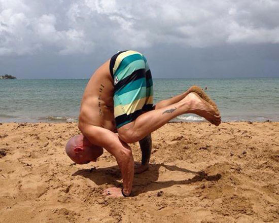 Pigeon Pose on the beach